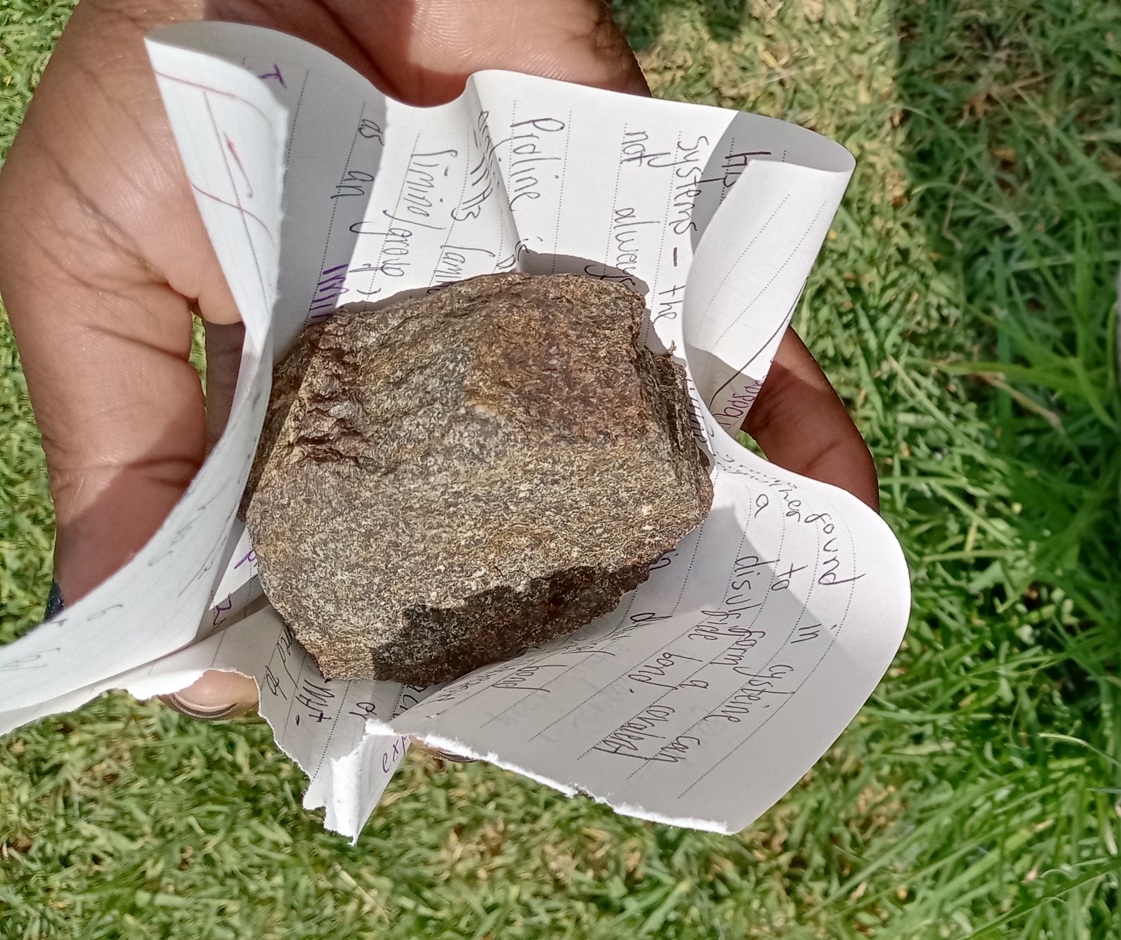 an image depicting how paper beats rock